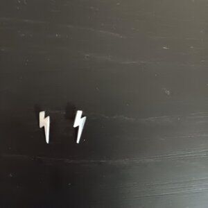 2 silver lightning bolt dermal tops $15 each